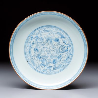 A Chinese blue and white pencil-style 'Buddhist Lions' plate, Chenghua mark, Shunzhi/Kangxi