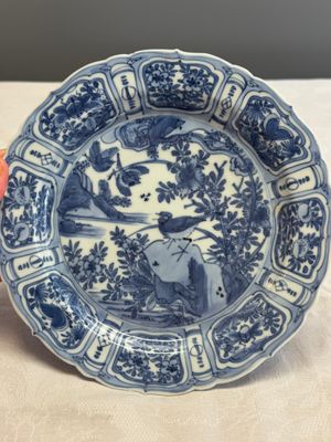 A Chinese blue and white plate with birds in a landscape — photo 1