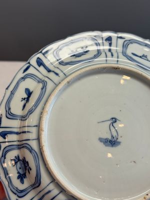 A Chinese blue and white plate with birds in a landscape — photo 11
