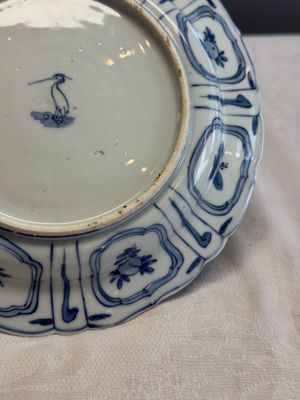 A Chinese blue and white plate with birds in a landscape — photo 12
