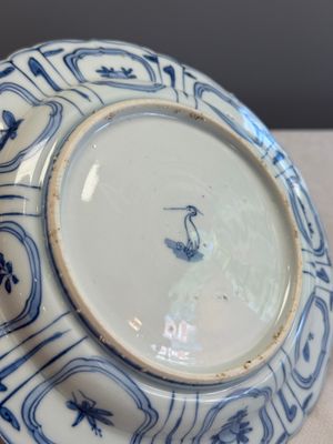 A Chinese blue and white plate with birds in a landscape — photo 13