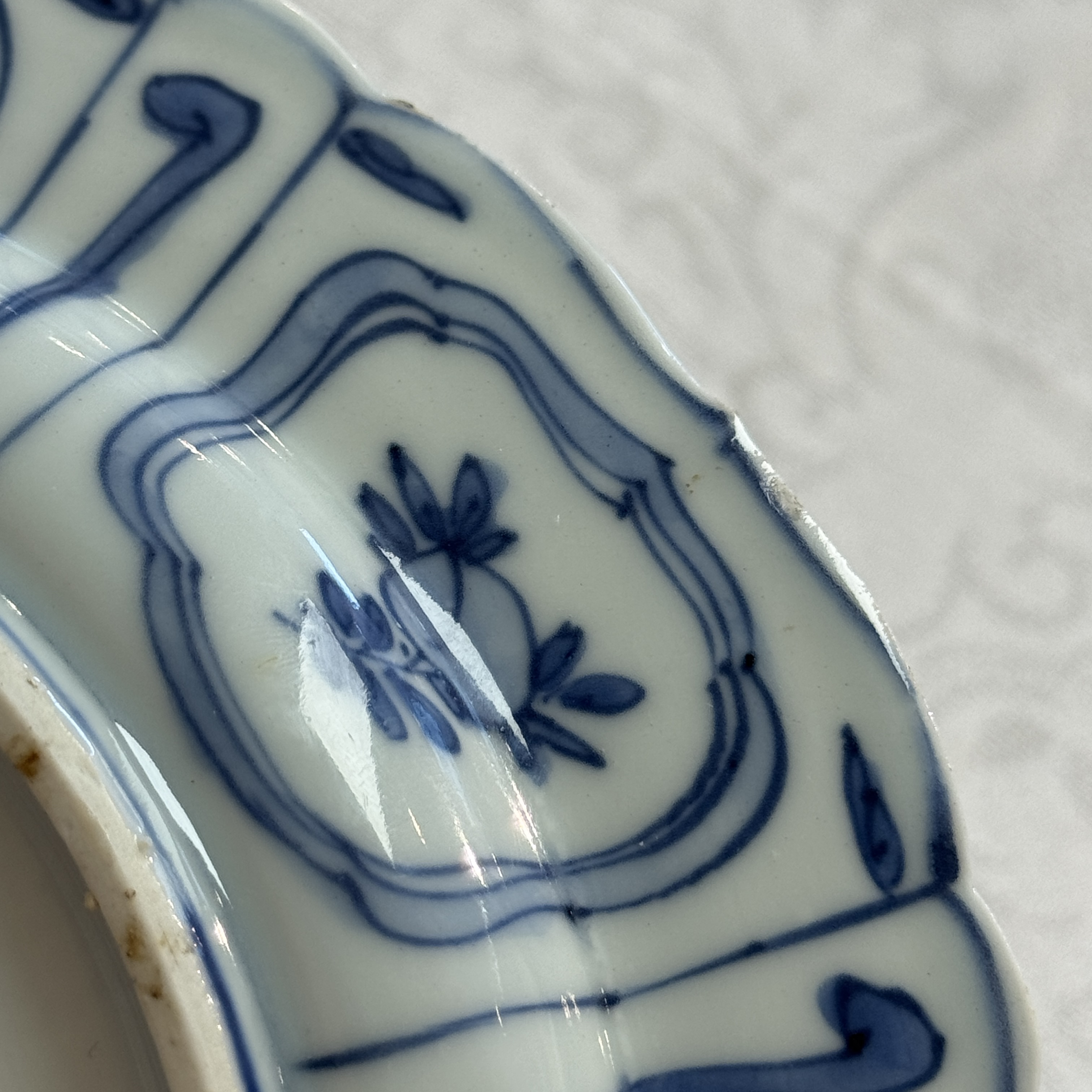 A Chinese blue and white plate with birds in a landscape — photo 18