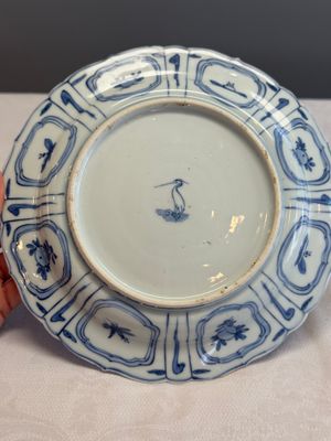 A Chinese blue and white plate with birds in a landscape — photo 8