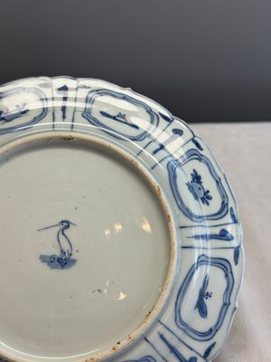 A Chinese blue and white plate with birds in a landscape — photo 10