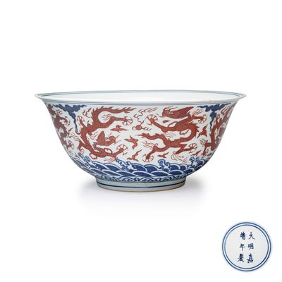 A Chinese blue, white and iron-red 'Dragons' bowl, Jiajing mark and of the period