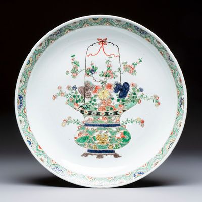 A Chinese famille verte 'Flower Basket' dish, lozenge mark, Kangxi