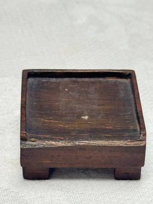 A Chinese famille verte sancai biscuit 'Crab' water pot and a 'Swastika' square bottle on a later wooden stand — photo 13