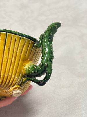 A Chinese famille verte sancai biscuit 'Lotus' teapot on a later wooden stand — photo 9