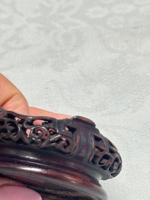 A Chinese famille verte sancai biscuit 'Lotus' teapot on a later wooden stand — photo 15