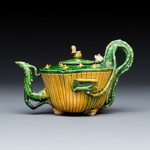 A Chinese famille verte sancai biscuit 'Lotus' teapot on a later wooden stand — photo 2