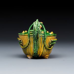 A Chinese famille verte sancai biscuit 'Lotus' teapot on a later wooden stand — photo 3