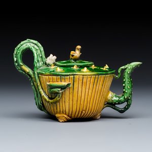A Chinese famille verte sancai biscuit 'Lotus' teapot on a later wooden stand — photo 4
