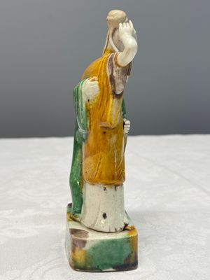 A Chinese famille verte sancai biscuit group of a man embracing a lady — photo 4