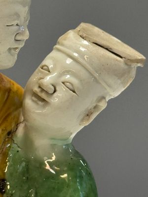 A Chinese famille verte sancai biscuit group of a man embracing a lady — photo 7