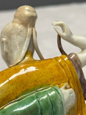 A Chinese famille verte sancai biscuit group of a man embracing a lady — photo 9