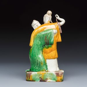 A Chinese famille verte sancai biscuit group of a man embracing a lady — photo 4