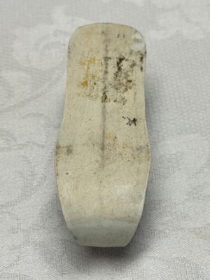 A Chinese famille verte sancai biscuit libation cup and a model of a shoe — photo 11