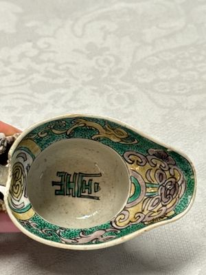 A Chinese famille verte sancai biscuit libation cup and a model of a shoe — photo 15