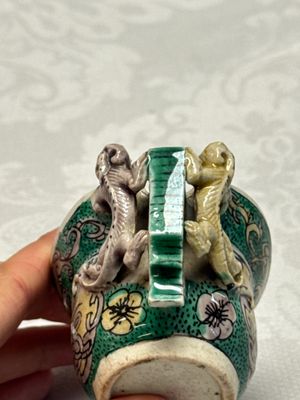 A Chinese famille verte sancai biscuit libation cup and a model of a shoe — photo 16