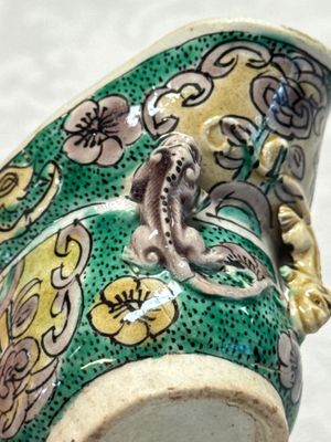 A Chinese famille verte sancai biscuit libation cup and a model of a shoe — photo 18