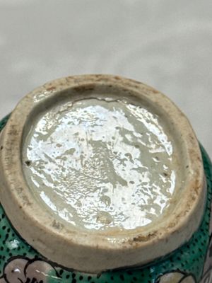A Chinese famille verte sancai biscuit libation cup and a model of a shoe — photo 26