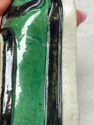 A Chinese famille verte sancai biscuit libation cup and a model of a shoe — photo 6
