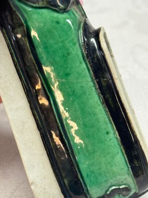 A Chinese famille verte sancai biscuit libation cup and a model of a shoe — photo 7