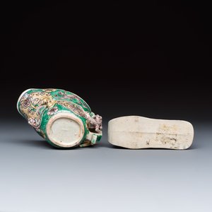 A Chinese famille verte sancai biscuit libation cup and a model of a shoe — photo 7