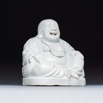 A Chinese white-glazed Milefo Buddha, 19th C.