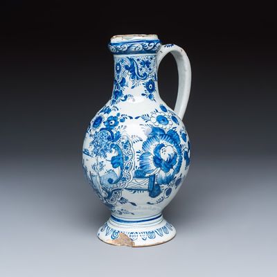 A blue and white Dutch Delft 'Pastoral Landscape' ewer, 18th C.