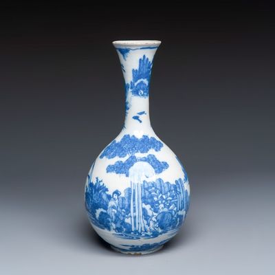 A blue and white Dutch Delft chinoiserie bottle vase, 17th C.