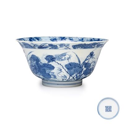 A fine Chinese blue and white 'Herons by a Lotus Pond' bowl, Fu mark, Kangxi