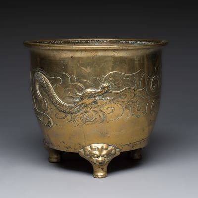 A large Chinese bronze 'Dragon' tripod censer, 19th C.
