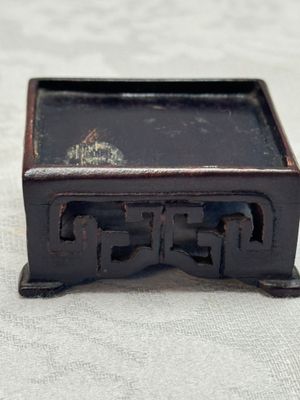 A pair of Chinese aubergine-glazed openworked square brush pots on later wooden stands — photo 17