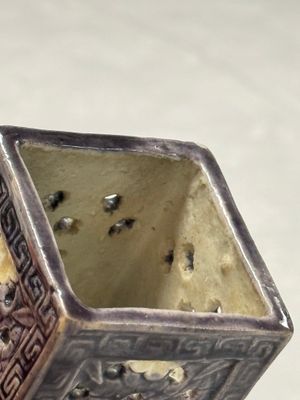 A pair of Chinese aubergine-glazed openworked square brush pots on later wooden stands — photo 26