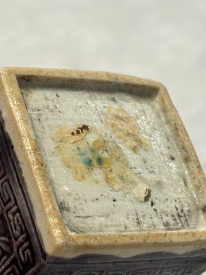 A pair of Chinese aubergine-glazed openworked square brush pots on later wooden stands — photo 29