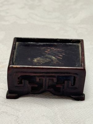 A pair of Chinese aubergine-glazed openworked square brush pots on later wooden stands — photo 33
