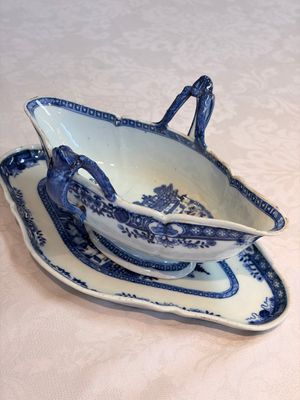 A pair of Chinese blue and white handled sauce boats and stands with pagodas along a river — photo 2