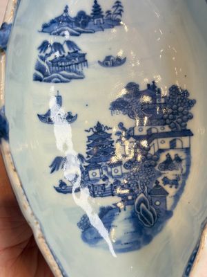 A pair of Chinese blue and white handled sauce boats and stands with pagodas along a river — photo 4