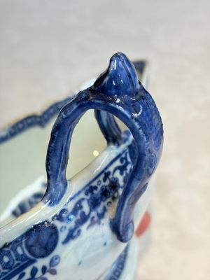 A pair of Chinese blue and white handled sauce boats and stands with pagodas along a river — photo 6