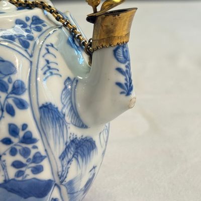 A pair of Chinese blue and white lotus-shaped teapots with mounts — photo 11