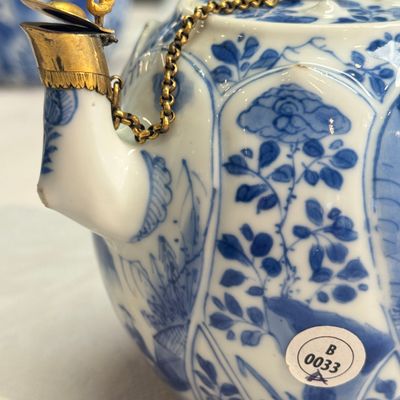 A pair of Chinese blue and white lotus-shaped teapots with mounts — photo 12