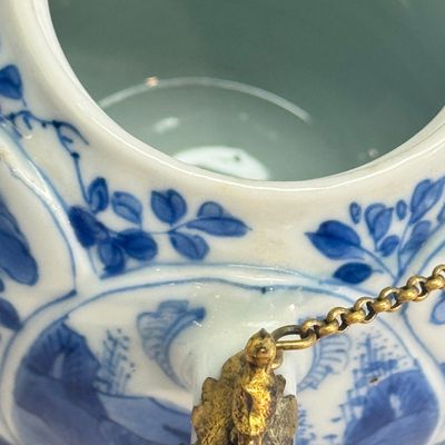 A pair of Chinese blue and white lotus-shaped teapots with mounts — photo 15