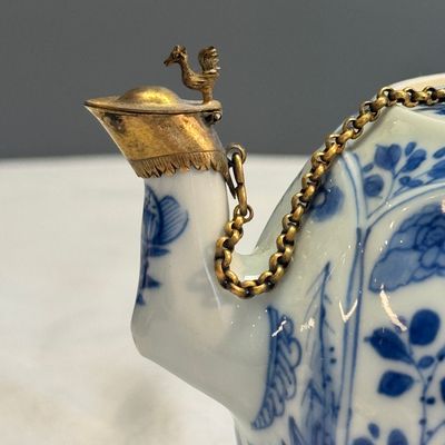 A pair of Chinese blue and white lotus-shaped teapots with mounts — photo 25