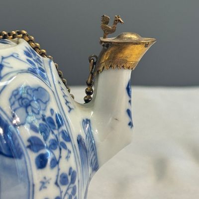 A pair of Chinese blue and white lotus-shaped teapots with mounts — photo 26