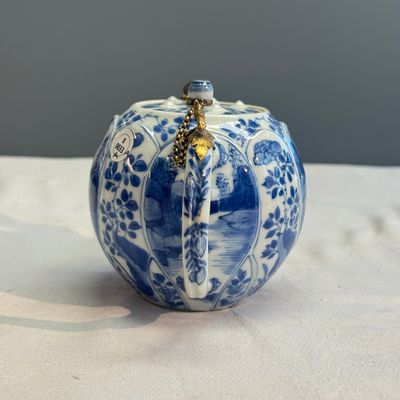 A pair of Chinese blue and white lotus-shaped teapots with mounts — photo 27