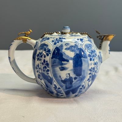 A pair of Chinese blue and white lotus-shaped teapots with mounts — photo 28