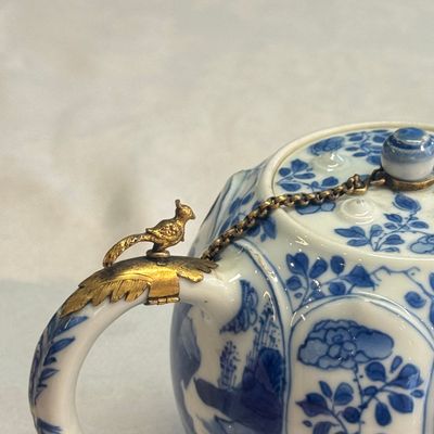 A pair of Chinese blue and white lotus-shaped teapots with mounts — photo 35