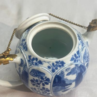 A pair of Chinese blue and white lotus-shaped teapots with mounts — photo 36
