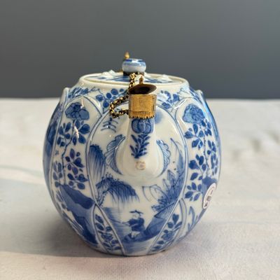 A pair of Chinese blue and white lotus-shaped teapots with mounts — photo 5